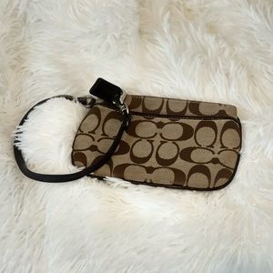 Coach tan wristlet 4.5X6 inches
